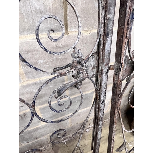 113 - A pair of vintage French wrought iron gates, width 110cm, height 250cm