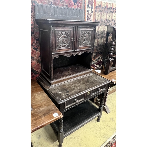 11 - An 18th century style Flemish carved oak side cabinet, width 80cm, depth 62cm, height 165cm