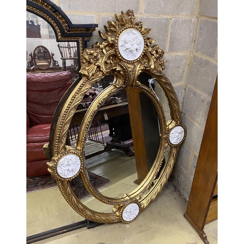 115 - A Victorian style gilt composition and faux marble wall mirror, width 100cm, height 144cm