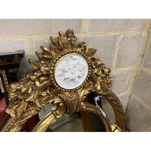 115 - A Victorian style gilt composition and faux marble wall mirror, width 100cm, height 144cm