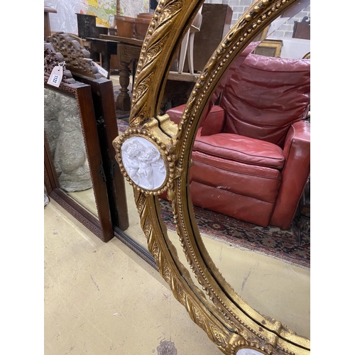 115 - A Victorian style gilt composition and faux marble wall mirror, width 100cm, height 144cm