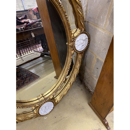 115 - A Victorian style gilt composition and faux marble wall mirror, width 100cm, height 144cm