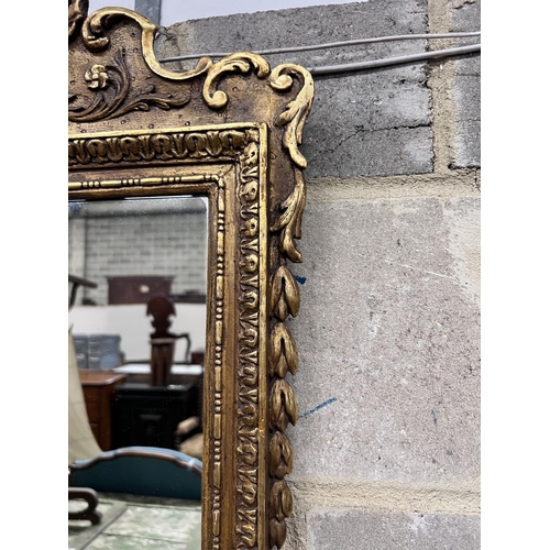 120 - A George II giltwood mirror, later plate, width 45cm, height 80cm