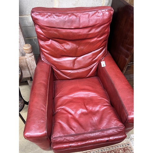 125 - A contemporary red leather armchair, width 85cm, depth 100cm, height 100cm