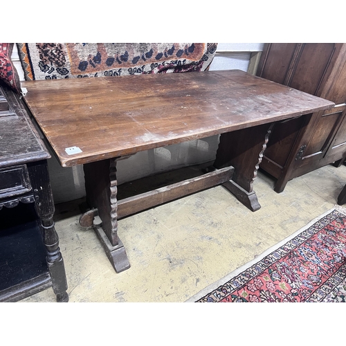 13 - A 1920's rectangular oak dining table, length 145cm, depth 74cm, height 76cm