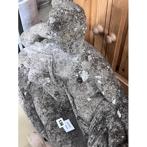 136 - A reconstituted stone reclining female garden ornament, length 90cm, height 50cm