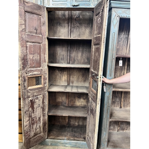 141 - An Indonesian painted hardwood tall cabinet, width 81cm, depth 39cm, height 247cm