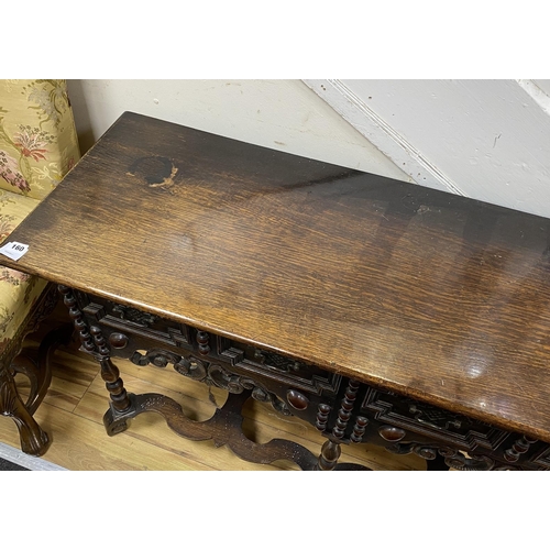 160 - A small Jacobean revival oak two drawer serving table, width 128cm, depth 46cm, height 72cm