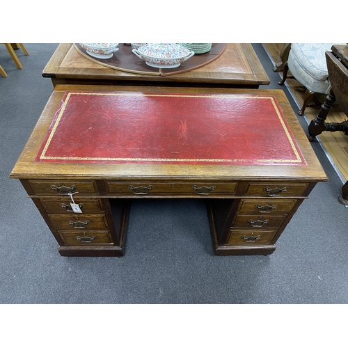 164 - A late Victorian oak pedestal desk, width 122cm, depth 64cm, height 73cm