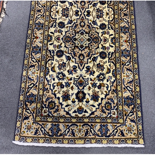 166 - A North West Persian ivory ground runner, 400 x90cm