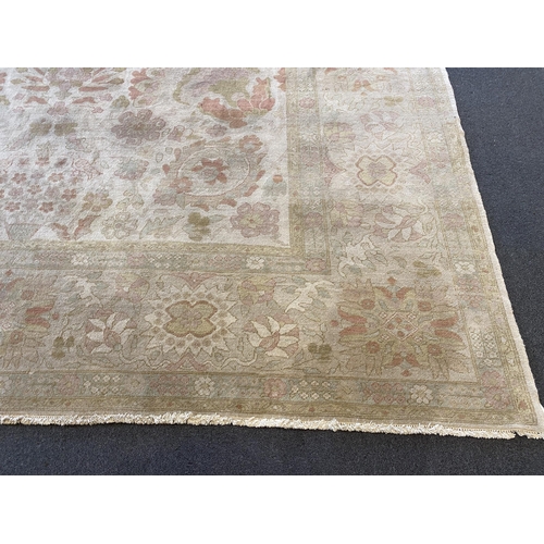 171 - A large Indian ivory ground carpet, 445 x 372cm