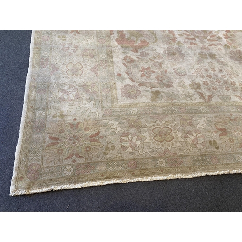 171 - A large Indian ivory ground carpet, 445 x 372cm