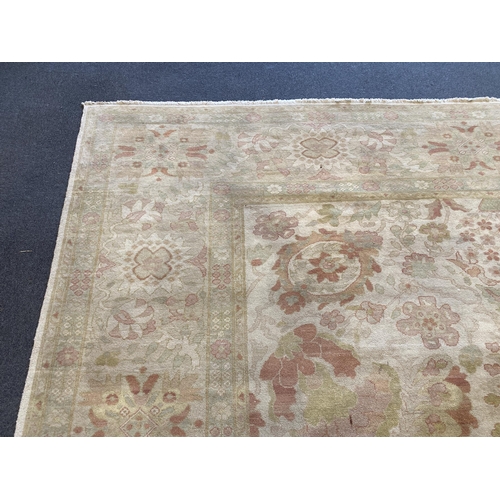 171 - A large Indian ivory ground carpet, 445 x 372cm