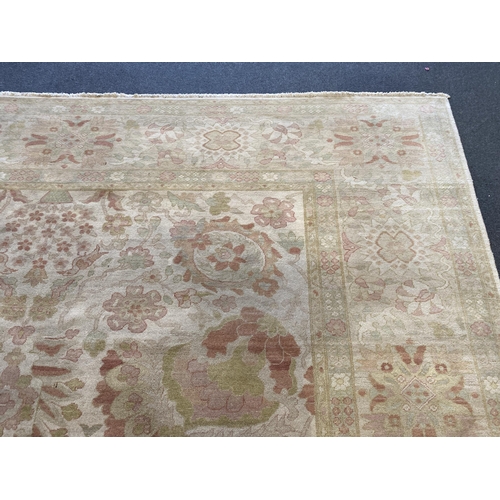 171 - A large Indian ivory ground carpet, 445 x 372cm