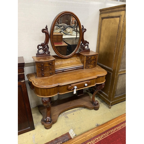 21 - A Victorian mahogany Duchesse dressing table, width 126cm, depth 50cm, height 159cm