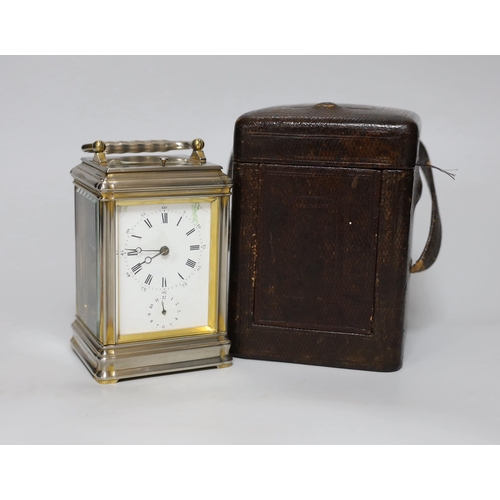 252 - A gorge-cased repeating carriage clock with enamel dial, numbered 15446 to the base, 16cm high, in t... 