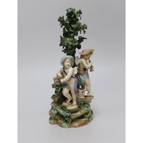 257 - An 18th century Derby figure group of three putti, 22cm high