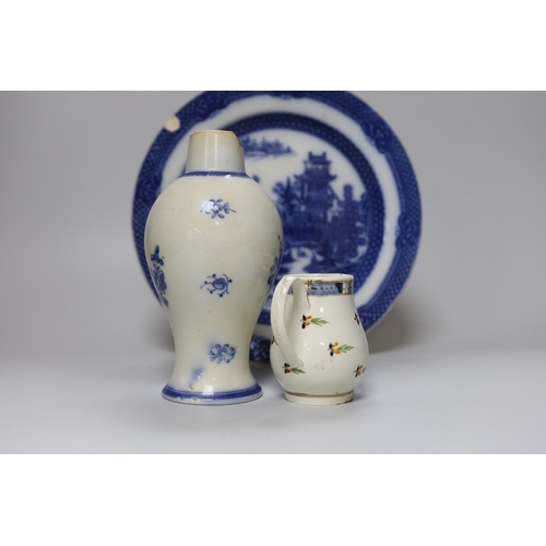 262 - A collection of early 19th century pottery including a good sparrowbeak jug painted with flowers, a ... 