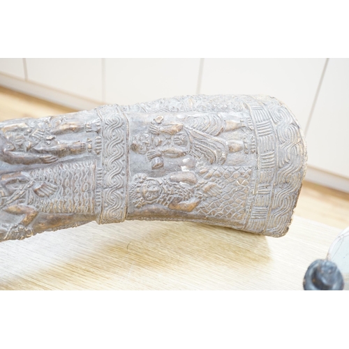 293 - An unusual Benin-style carved elephant femur, Nigeria, 73cm high