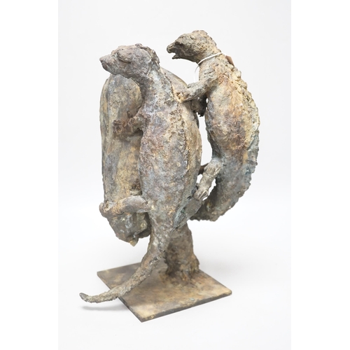 294 - A patinated bronze, two lizards scaling a rock, raised on a square base, monogrammed SMV and dated 1... 