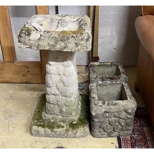 3 - A pebble effect reconstituted stone bird bath, height 67cm together with two similar smaller square ... 