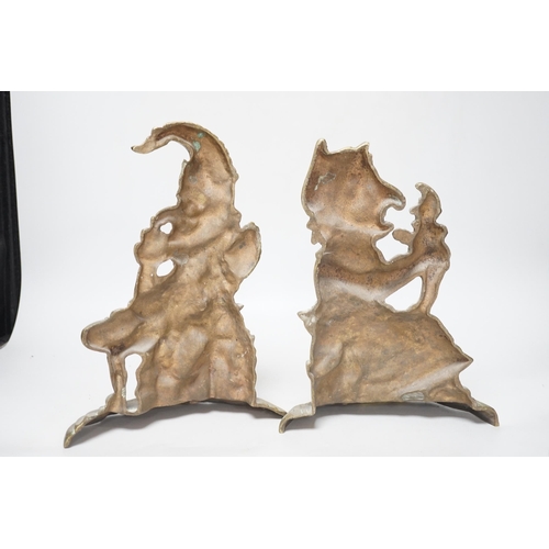 301 - A pair of cast brass Punch and Judy door-stops, the largest 28cm high