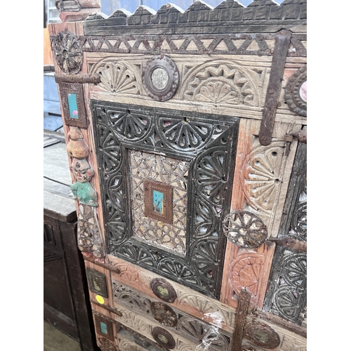 31 - An Indian painted carved hardwood cabinet, width 124cm, depth 43cm, height 125cm