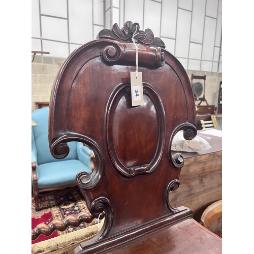 34 - A Victorian mahogany hall chair, height 90cm