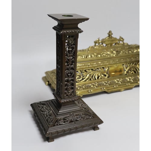 351 - A Victorian cast brass pen and inkstand and a pair of cast brass candlesticks (3) 24cm tall