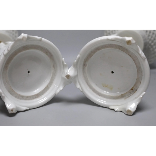 361 - A pair of Paris porcelain figural comports or centre pieces with lattice work baskets, each 38cm hig... 