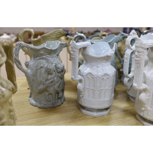 375 - A collection of Victorian Charles Meigh and TJ & JM Mayers stoneware jugs, including Gothic relief d... 