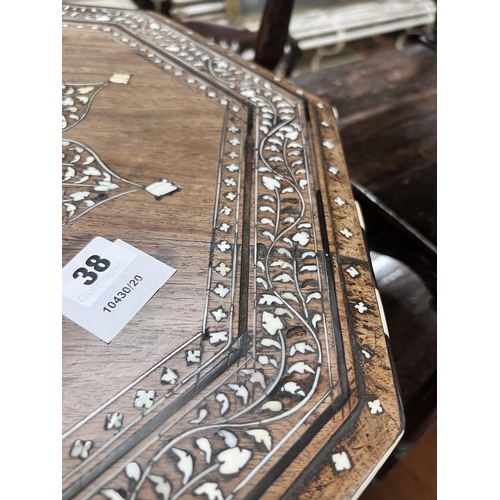 38 - An Indian octagonal bone inlaid hardwood occasional table, width 51cm, height 52cm