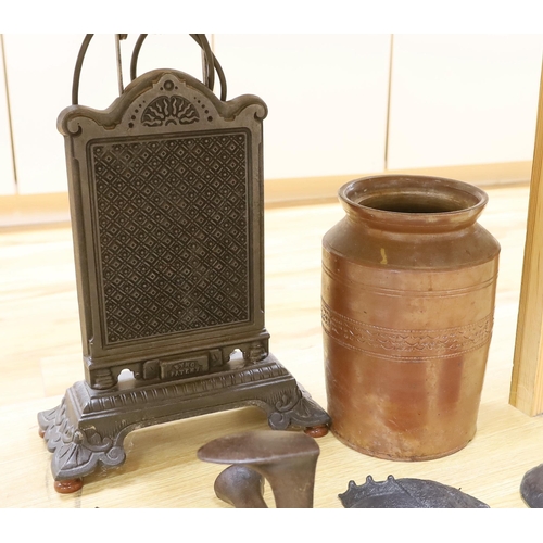 383 - Metalware comprising wrought iron heater, two metal plaques including one of Queen Victoria, boot ma... 