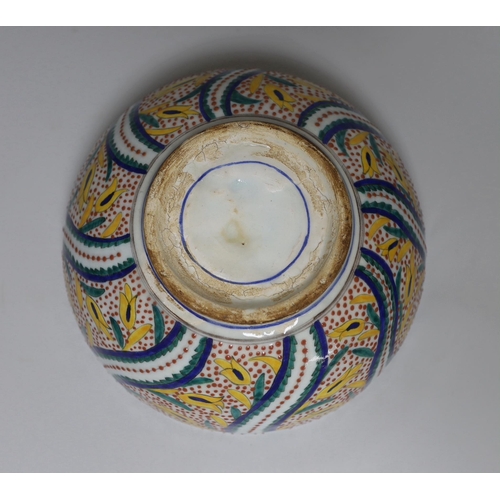 388 - A Turkish Kutahya bowl hand painted with stylised flowers, 19cm in diameter