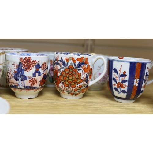 389 - A collection of late 18th century Worcester and Lowestoft coffee cups and a saucer, many hand painte... 