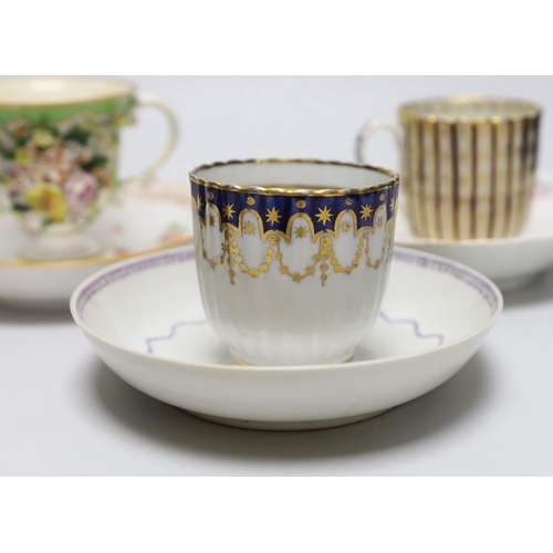 393 - A group of early 19th century English porcelain cups and various saucers to include a Spode two hand... 