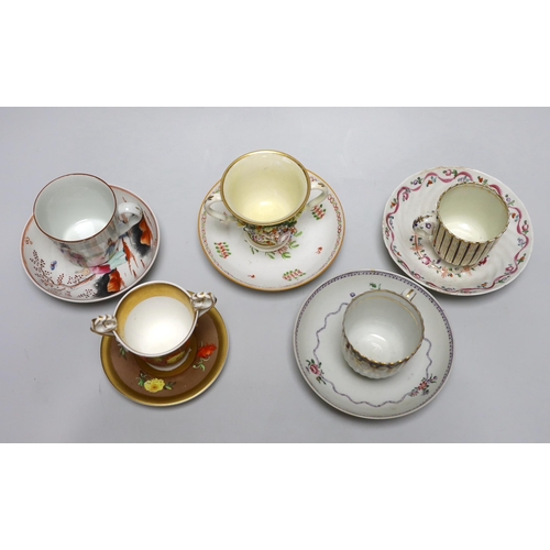 393 - A group of early 19th century English porcelain cups and various saucers to include a Spode two hand... 