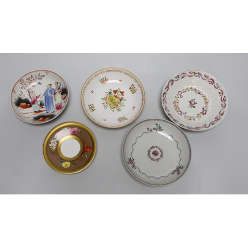 393 - A group of early 19th century English porcelain cups and various saucers to include a Spode two hand... 