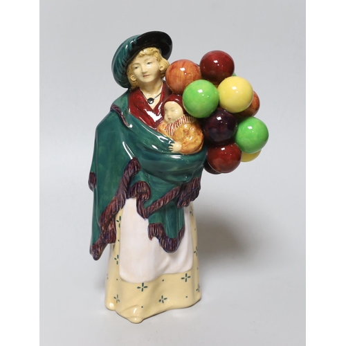 395 - A Royal Doulton figure, 'The Balloon Seller', HN583