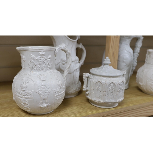 404 - A pair of William Brownfield Parian jugs, moulded with armorials for England, Scotland and Wales, tw... 