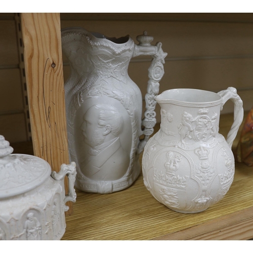 404 - A pair of William Brownfield Parian jugs, moulded with armorials for England, Scotland and Wales, tw... 