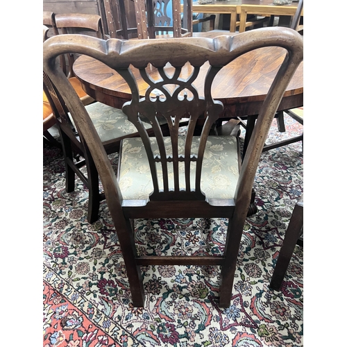 41 - A set of six George III style mahogany dining chairs including two carvers