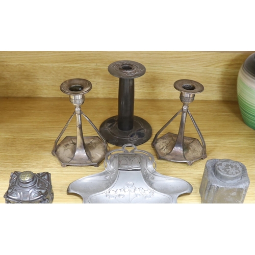 415 - Art Nouveau pewter consisting:- an Orivit two handled tray, pattern 2967, a pair of candlesticks, a ... 