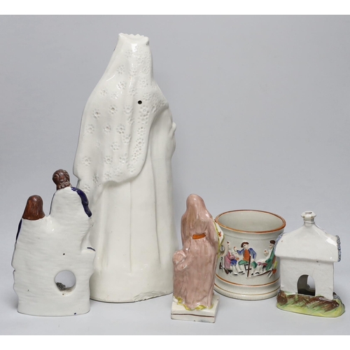 419 - A tall Staffordshire pottery figure of Queen Victoria, a Staffordshire 'frog' mug and three various ... 