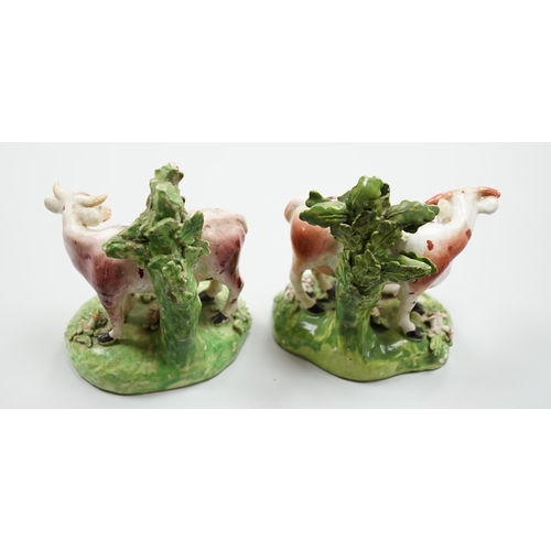 434 - A pair of Derby cow and calf groups, c.1780, 11cm