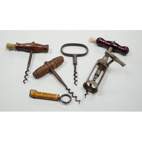 436 - A 19th century iron corkscrew, with a turned wood handle and four other corkscrews (5)