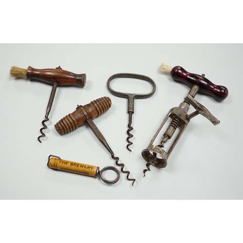 436 - A 19th century iron corkscrew, with a turned wood handle and four other corkscrews (5)