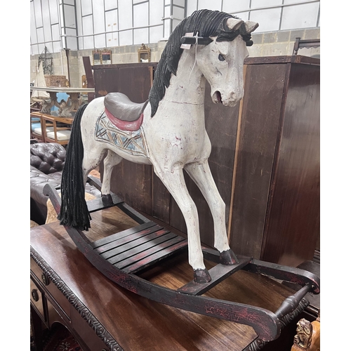 44 - A Victorian style painted hardwood rocking horse, height 80cm