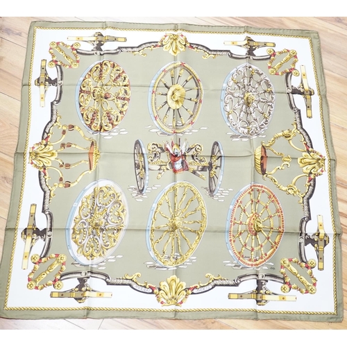 454 - Four vintage Hermes silk scarves including one retailed by Harrods comprising, Selles A Housse, Roue... 