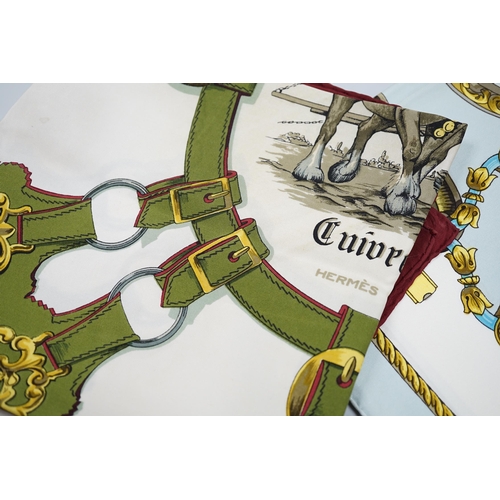 458 - Four vintage Hermes silk scarves including two retailed by Harrods comprising Cuivreries, Roues de C... 